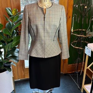 Tahari by Arthur S.Levine. Two piece suit with black skirt and open plaid jacket